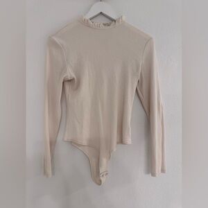 Cream Ruffle Neck Bodysuit